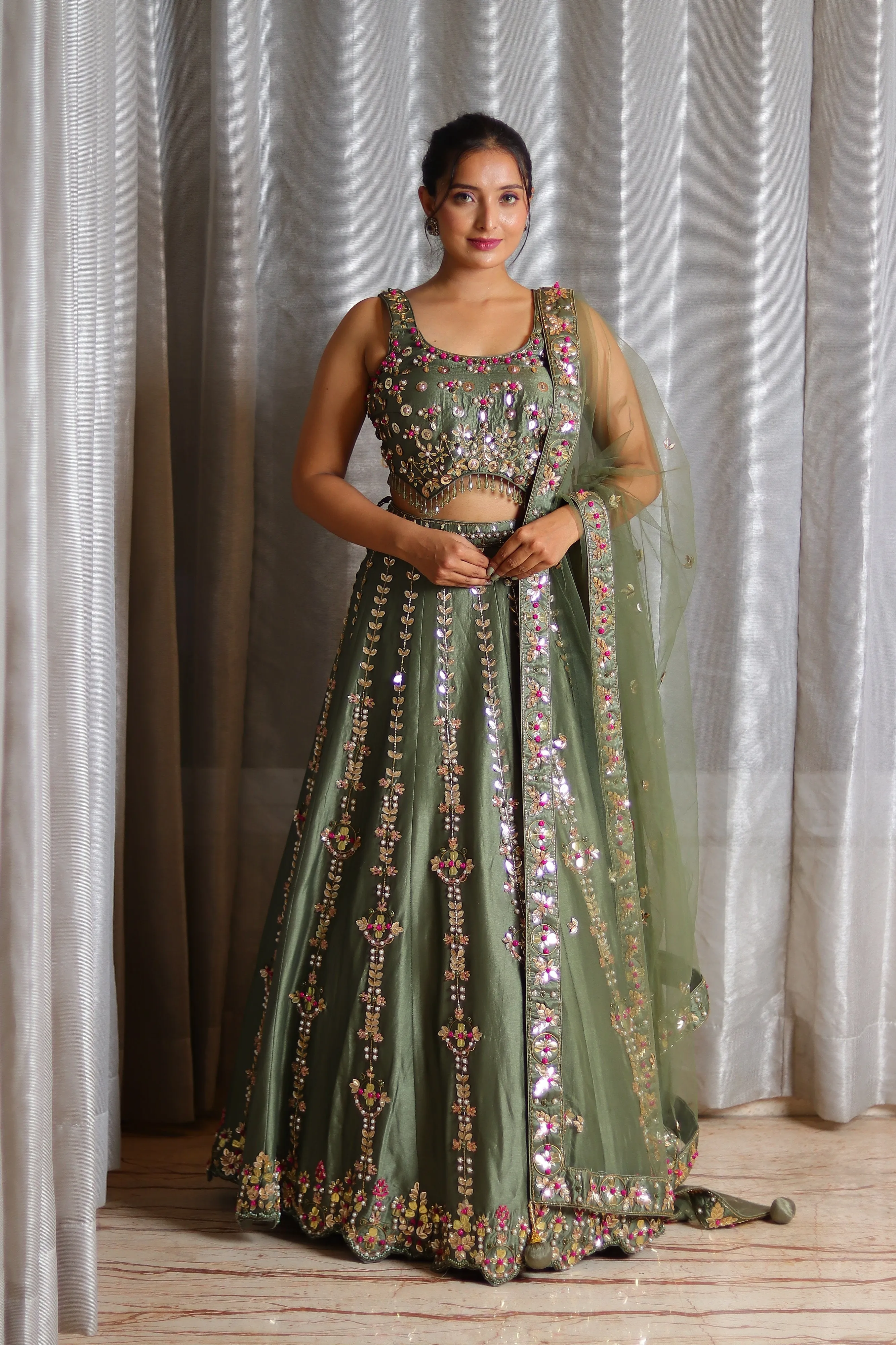 Gold Hand-Embroidered Designer Silk Lehenga with Multi-Color Metal and Thread Work