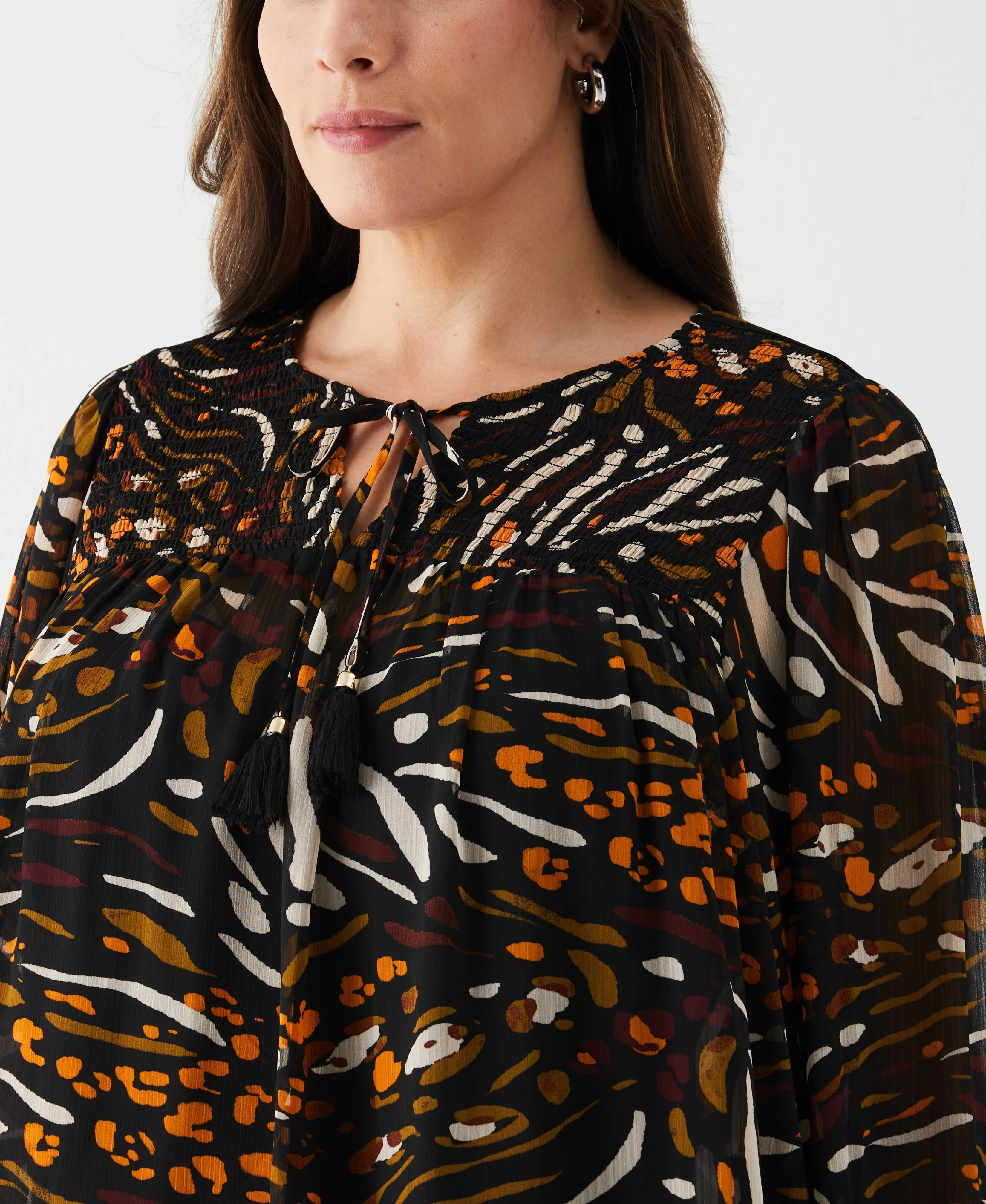 Plus Size Animal Print Smocked Split Neck Blouse