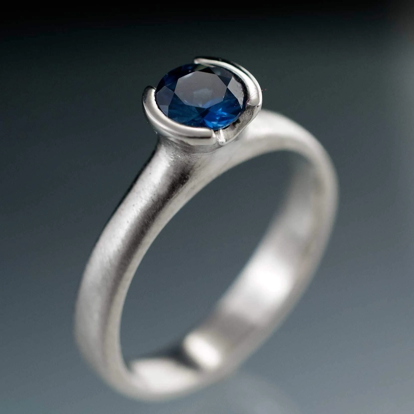 Round Fair Trade Blue/Teal Blue Malawi Sapphire Half Bezel Solitaire Engagement Ring