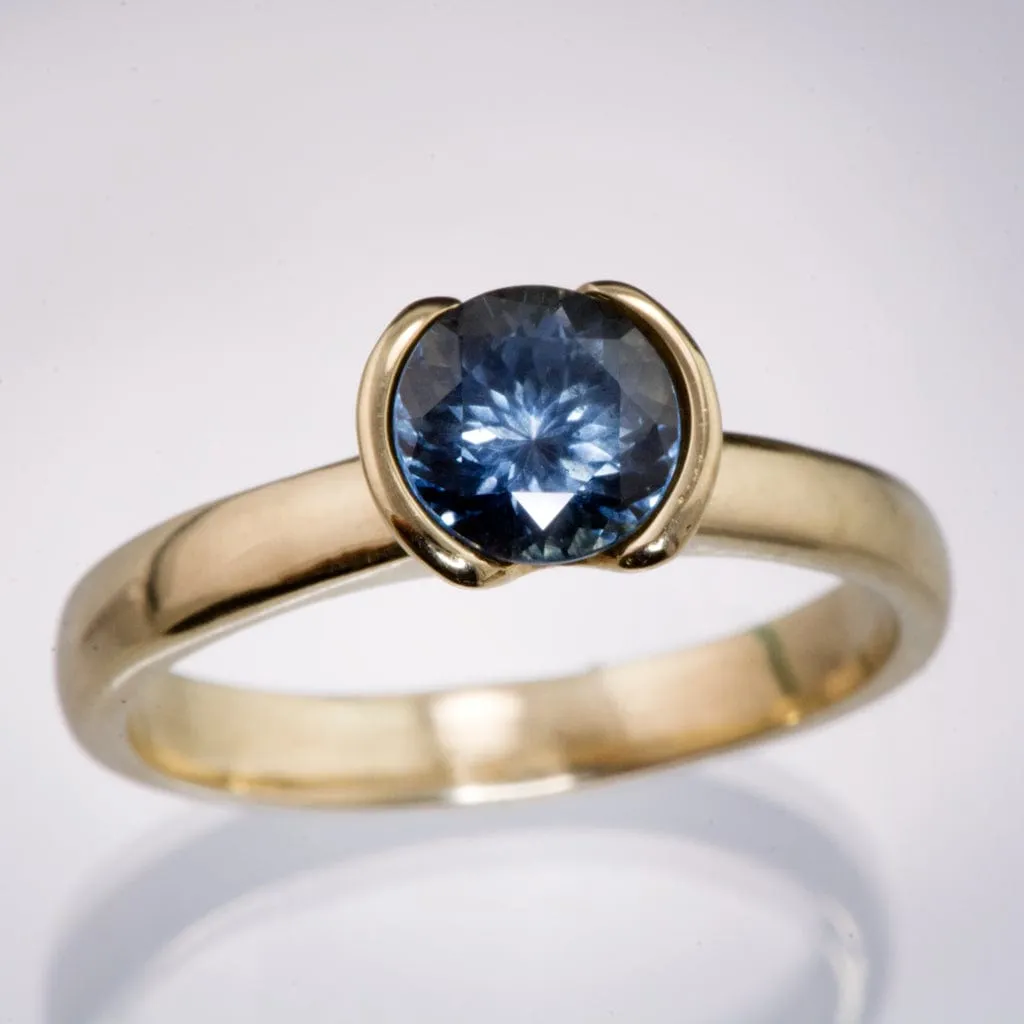 Round Fair Trade Blue/Teal Blue Malawi Sapphire Half Bezel Solitaire Engagement Ring