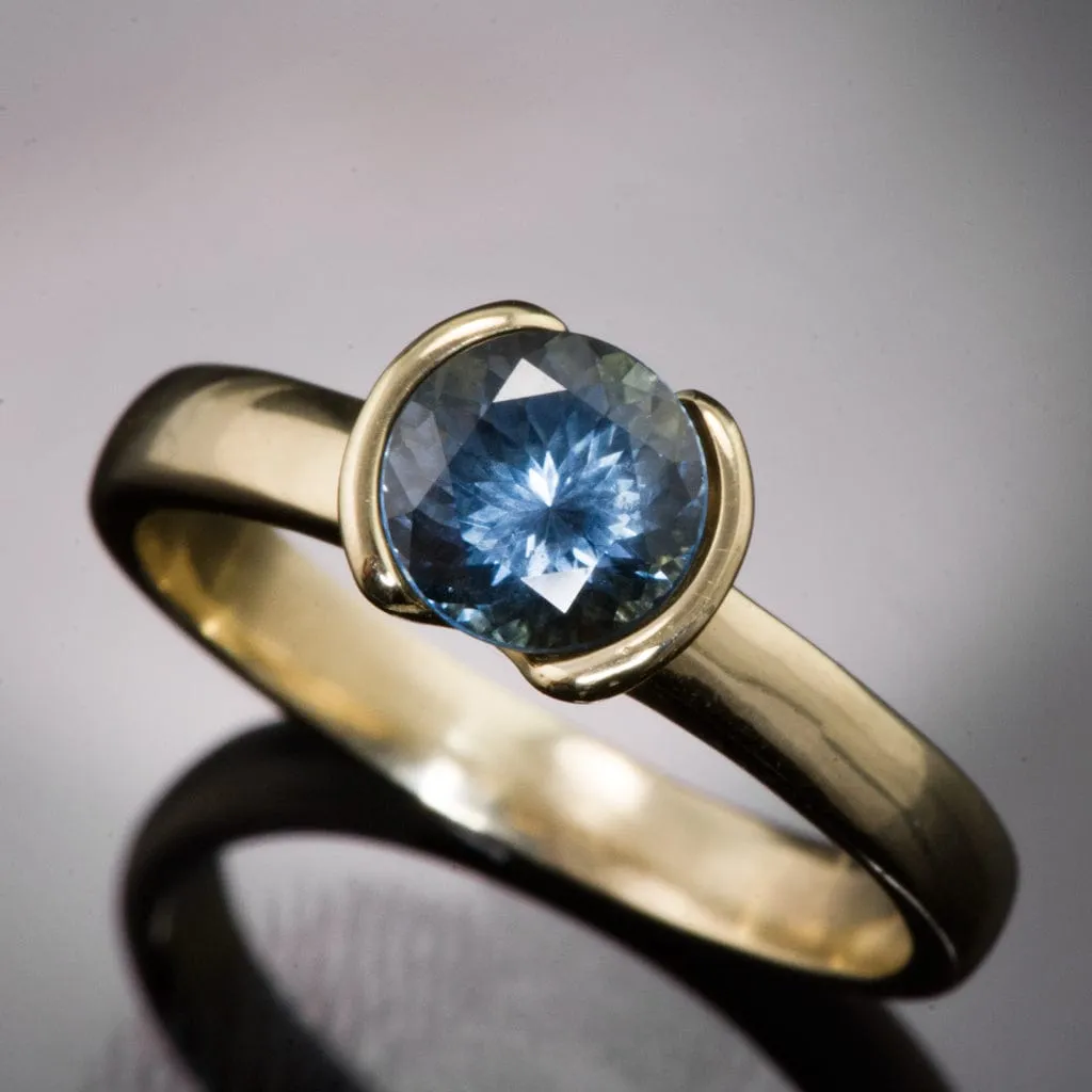 Round Fair Trade Blue/Teal Blue Malawi Sapphire Half Bezel Solitaire Engagement Ring